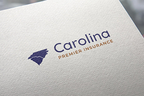 Carolina Premier Insurance logo printed on a paper
